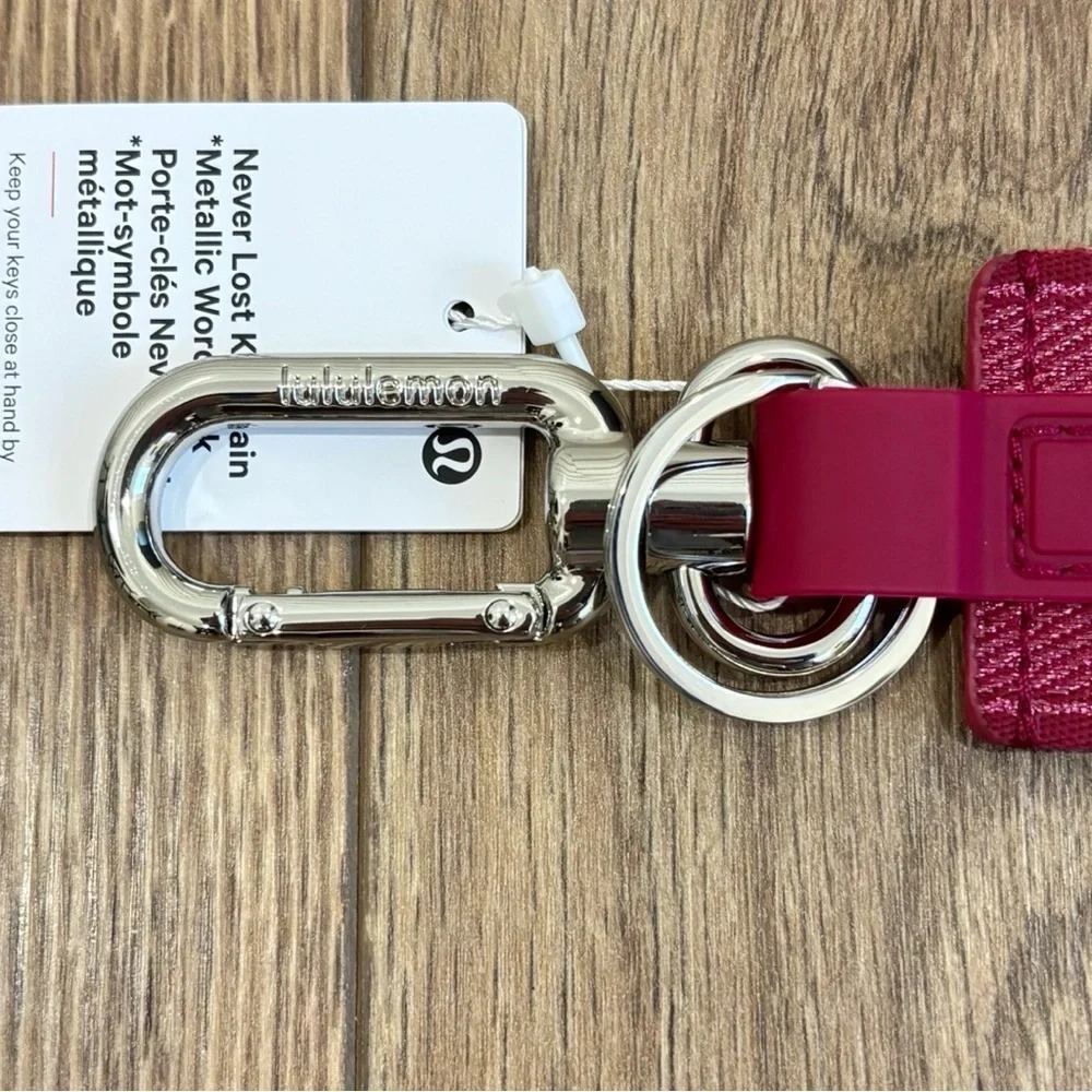NWT Lululemon Never Lost Keychain *Metallic Workmark In Berry Rumble